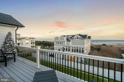 a spacious bedroom with a large bed and a window