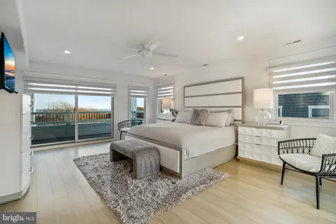 a view of a balcony with wooden floor