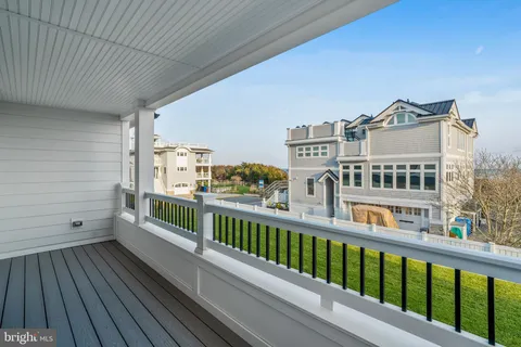 a bathroom with a double vanity sink mirror and shower