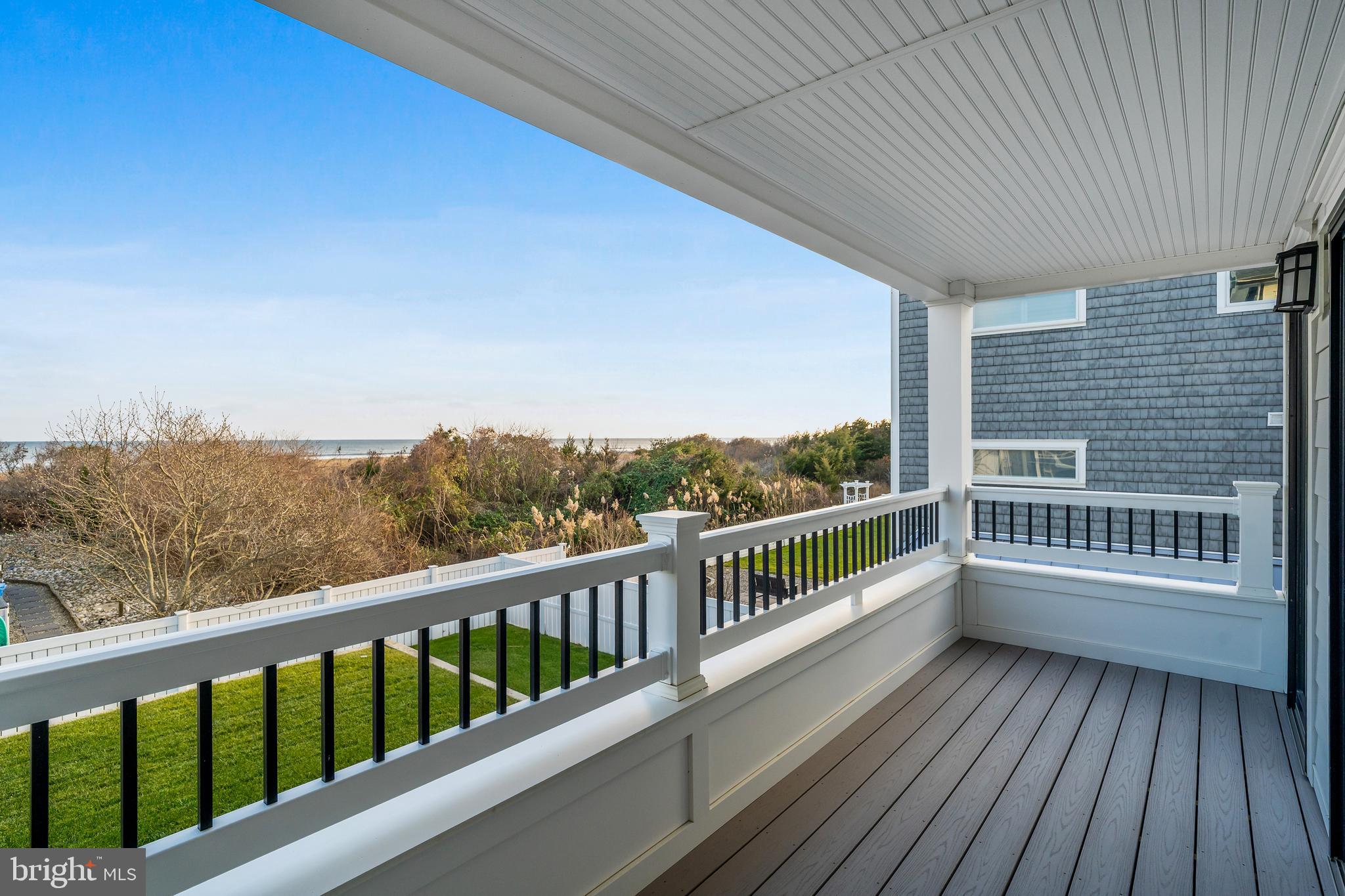 901 South Commonwealth Avenue, Unit SOUTH Strathmere, NJ 08248 - Photo 26 of 66 a view of a balcony with wooden floor