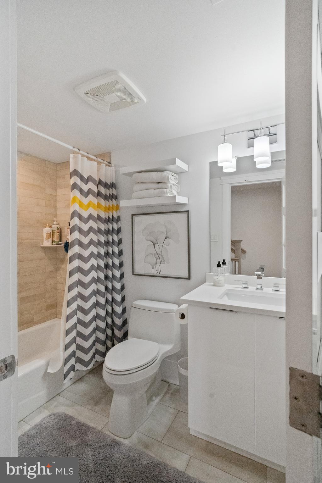 901 South Commonwealth Avenue, Unit SOUTH Strathmere, NJ 08248 - Photo 46 of 66 a bathroom with a sink a toilet and shower