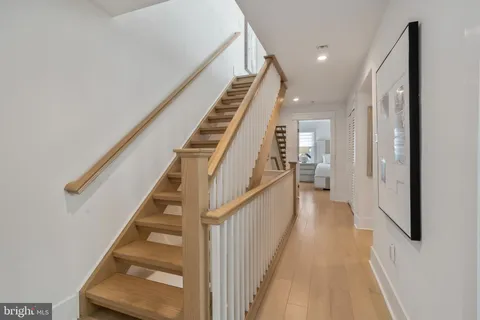 a room with water heater and wooden walls