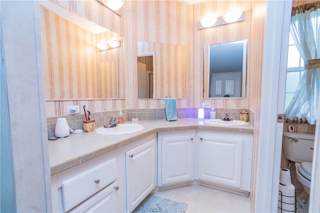 301 Valencia Street Sebastian, FL 32958 - Photo 15 of 29 a kitchen with a sink and cabinets