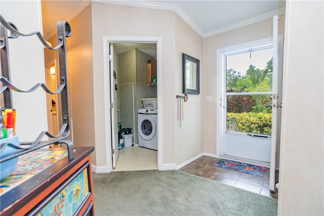 301 Valencia Street Sebastian, FL 32958 - Photo 17 of 29 a view of an entryway with wooden floor