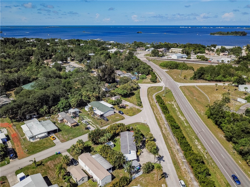 301 Valencia Street Sebastian, FL 32958 - Photo 22 of 29 an aerial view of residential houses with outdoor space