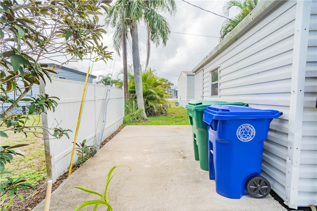301 Valencia Street Sebastian, FL 32958 - Photo 24 of 29 a view of a porch with furniture