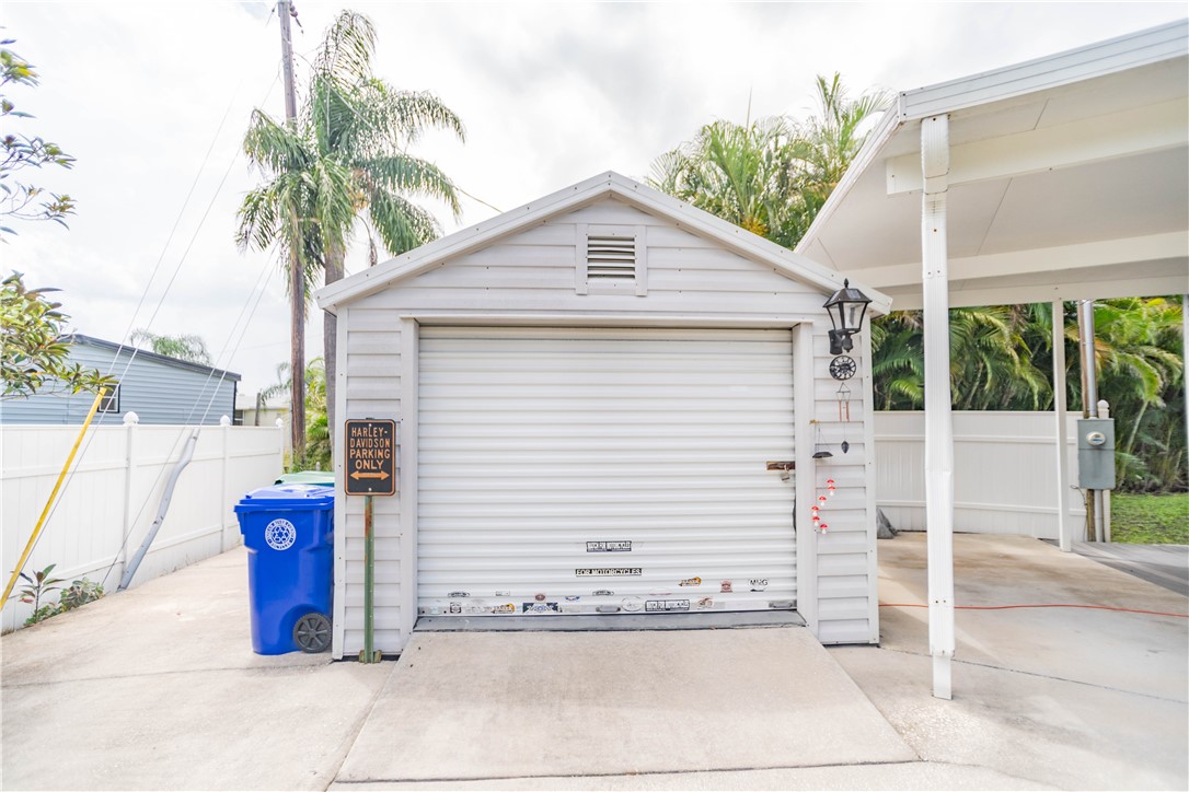 301 Valencia Street Sebastian, FL 32958 - Photo 25 of 29 a white house with a outdoor space