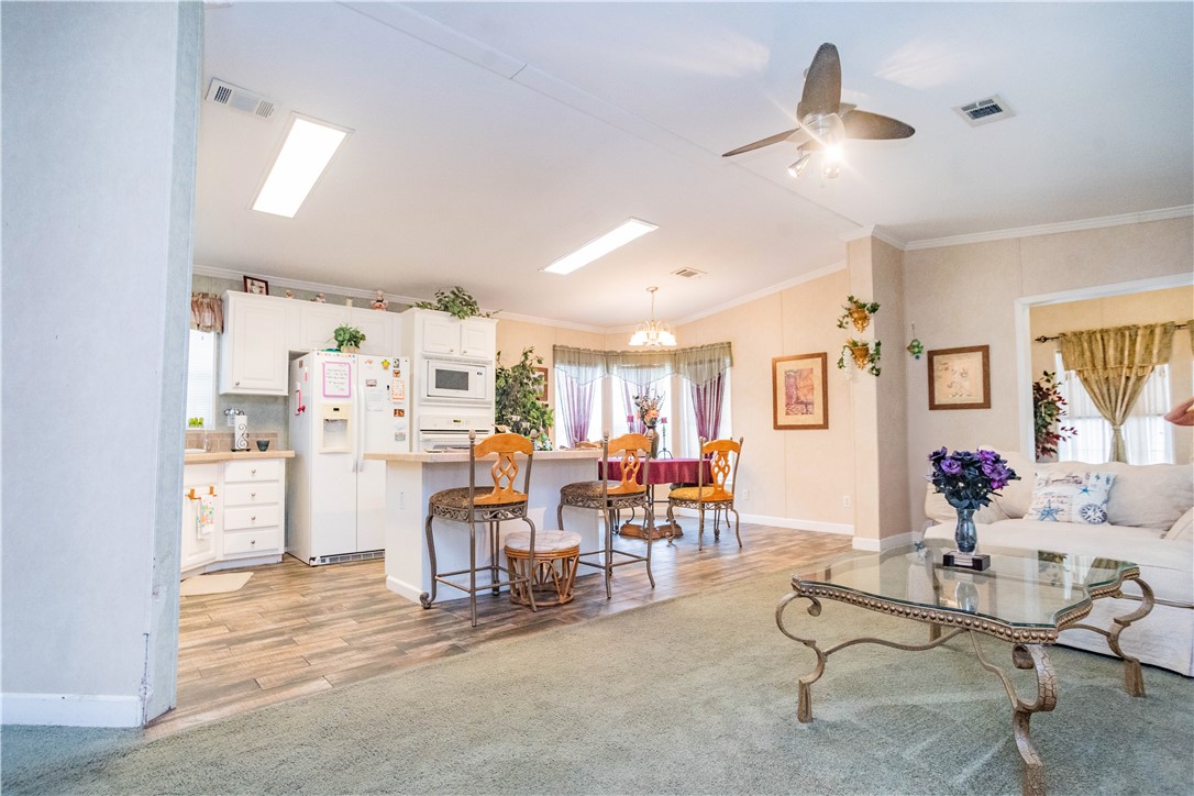 301 Valencia Street Sebastian, FL 32958 - Photo 4 of 29 a view of a livingroom with furniture and a window