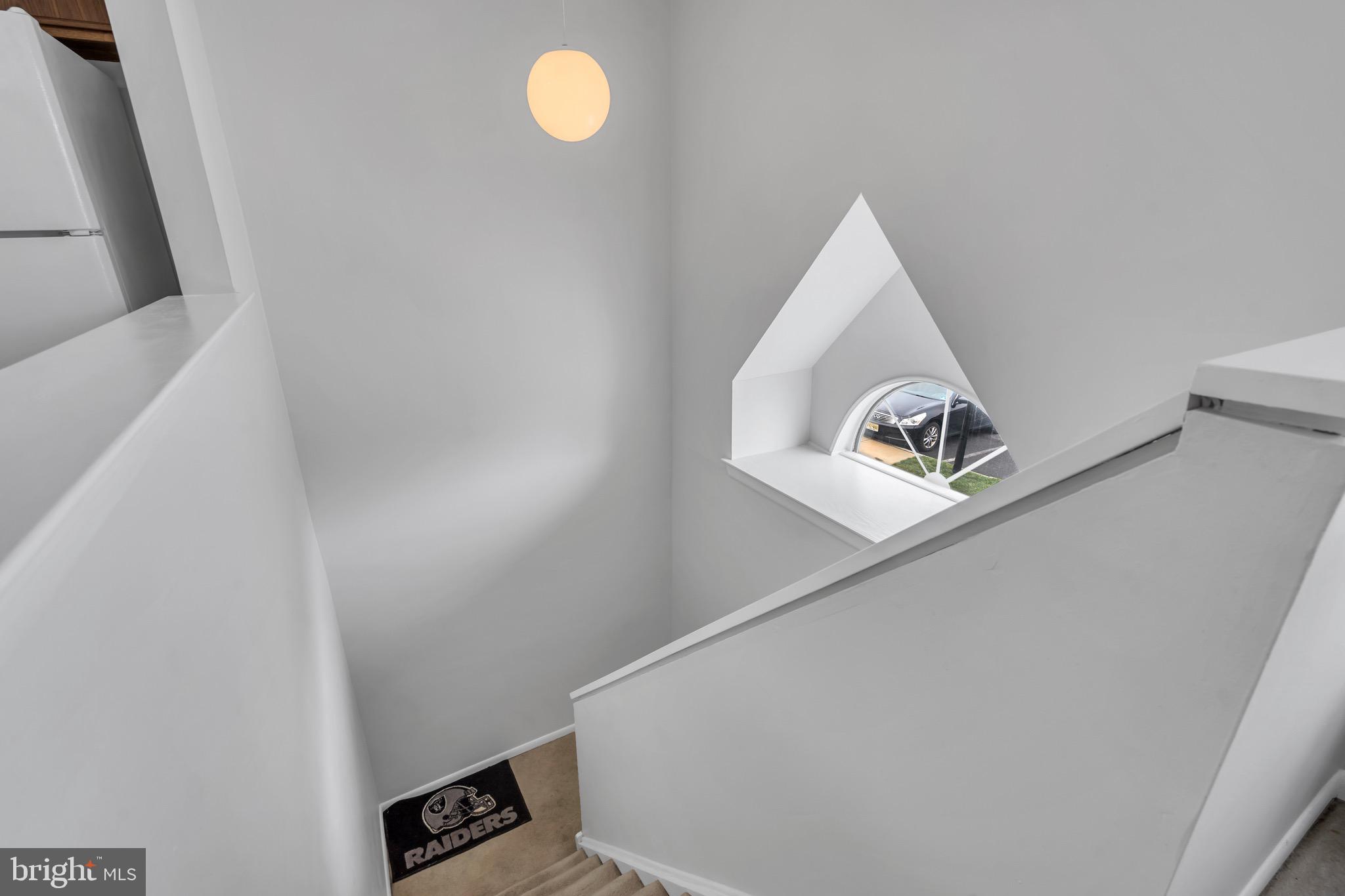 70 Pinewood Drive Hamilton, NJ 08690 - Photo 11 of 40 a view of staircase with white walls