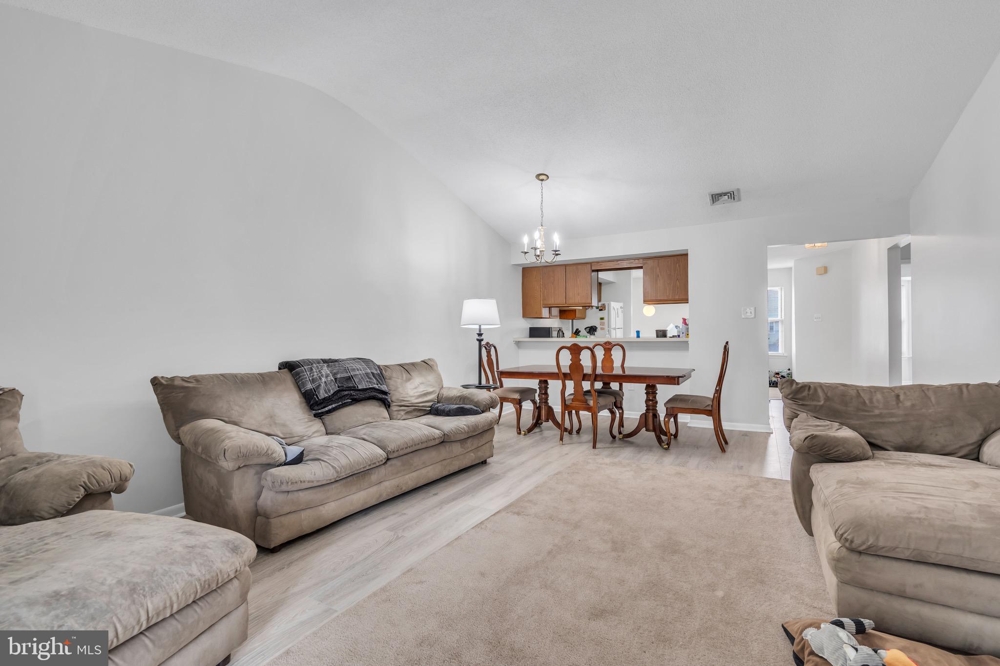 70 Pinewood Drive Hamilton, NJ 08690 - Photo 20 of 40 a living room with furniture and a couch
