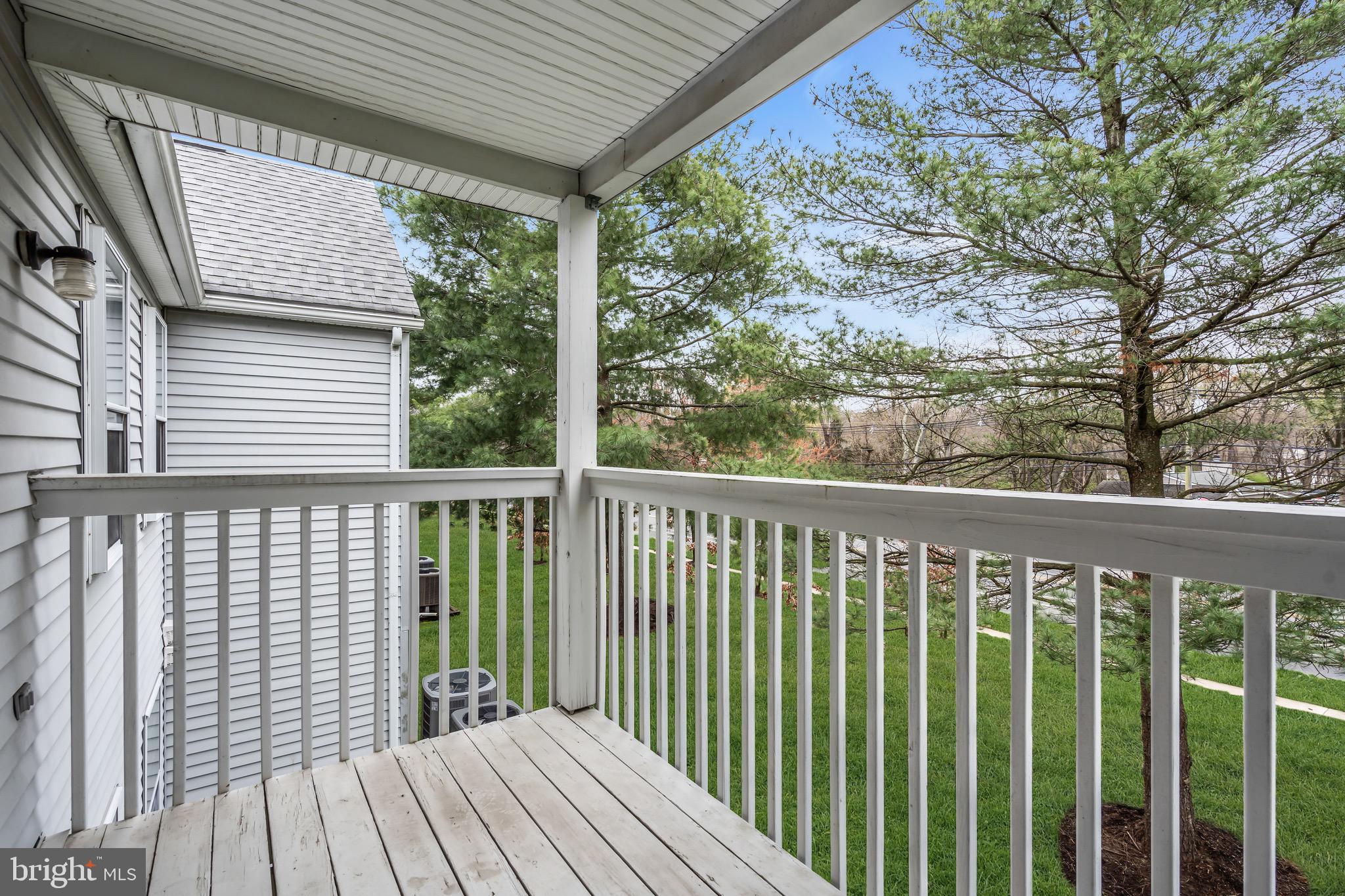 70 Pinewood Drive Hamilton, NJ 08690 - Photo 22 of 40 a view of a wooden balcony