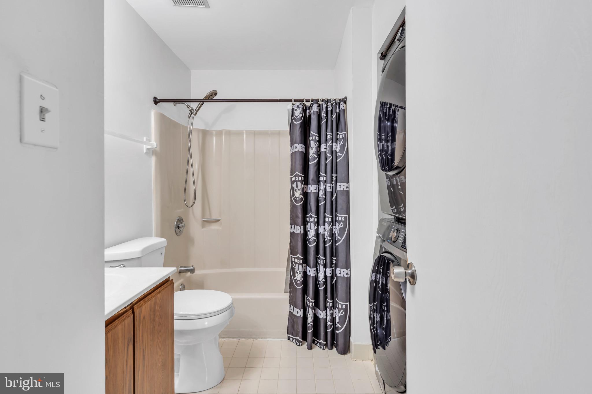70 Pinewood Drive Hamilton, NJ 08690 - Photo 24 of 40 a bathroom with a shower toilet and sink
