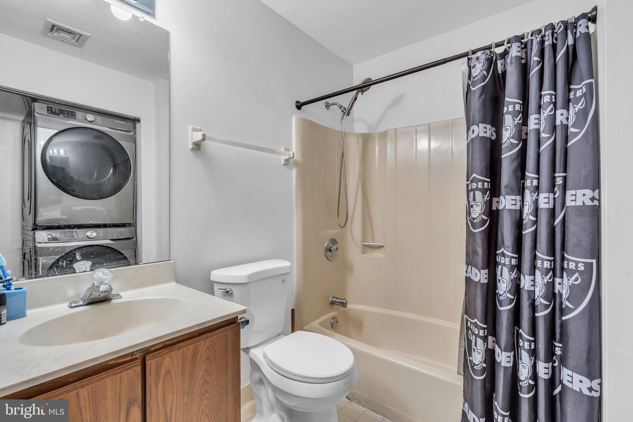 70 Pinewood Drive Hamilton, NJ 08690 - Photo 25 of 40 a bathroom with a sink toilet and shower