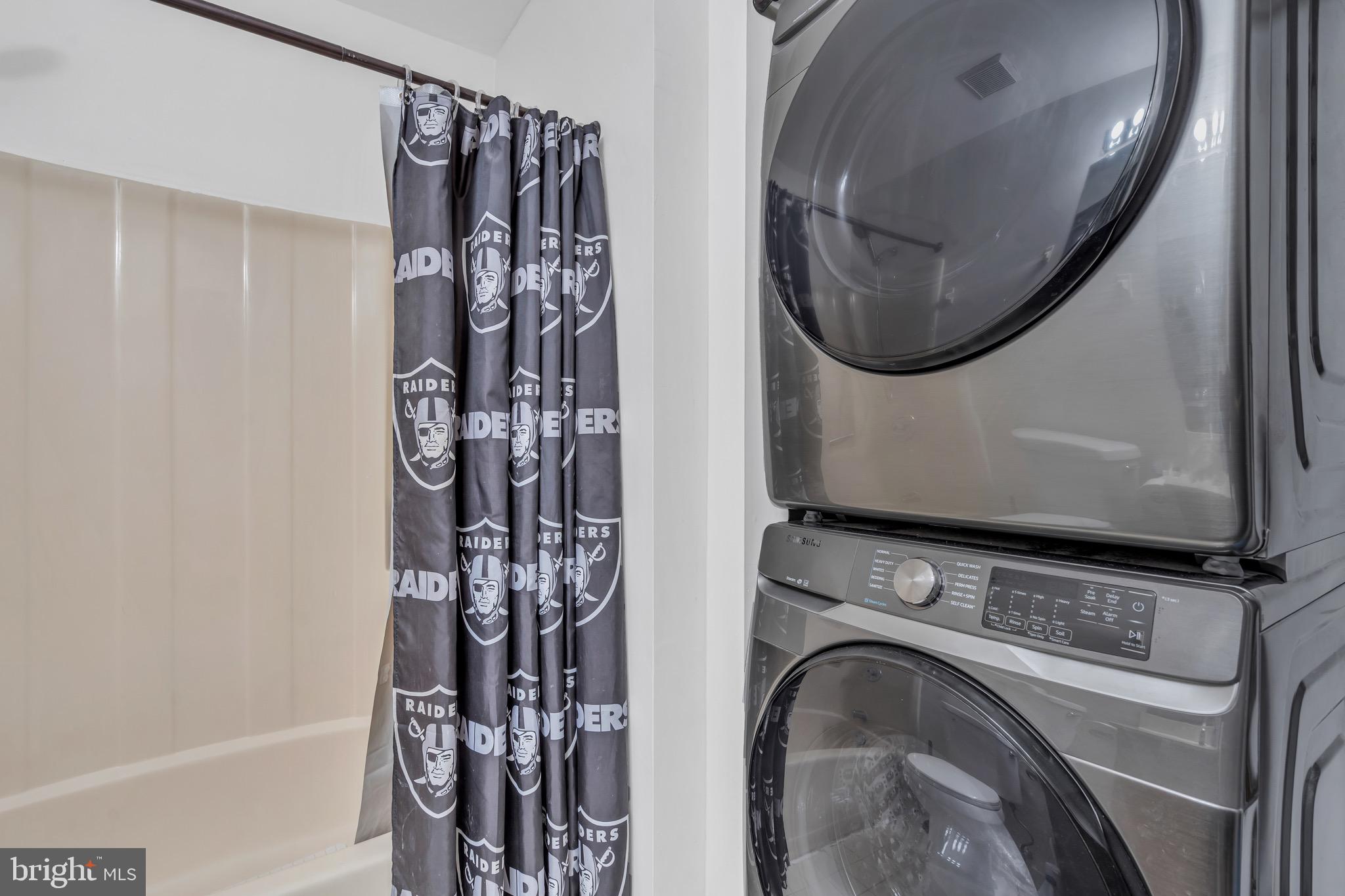 70 Pinewood Drive Hamilton, NJ 08690 - Photo 26 of 40 a view of a washer and dryer in a utility room