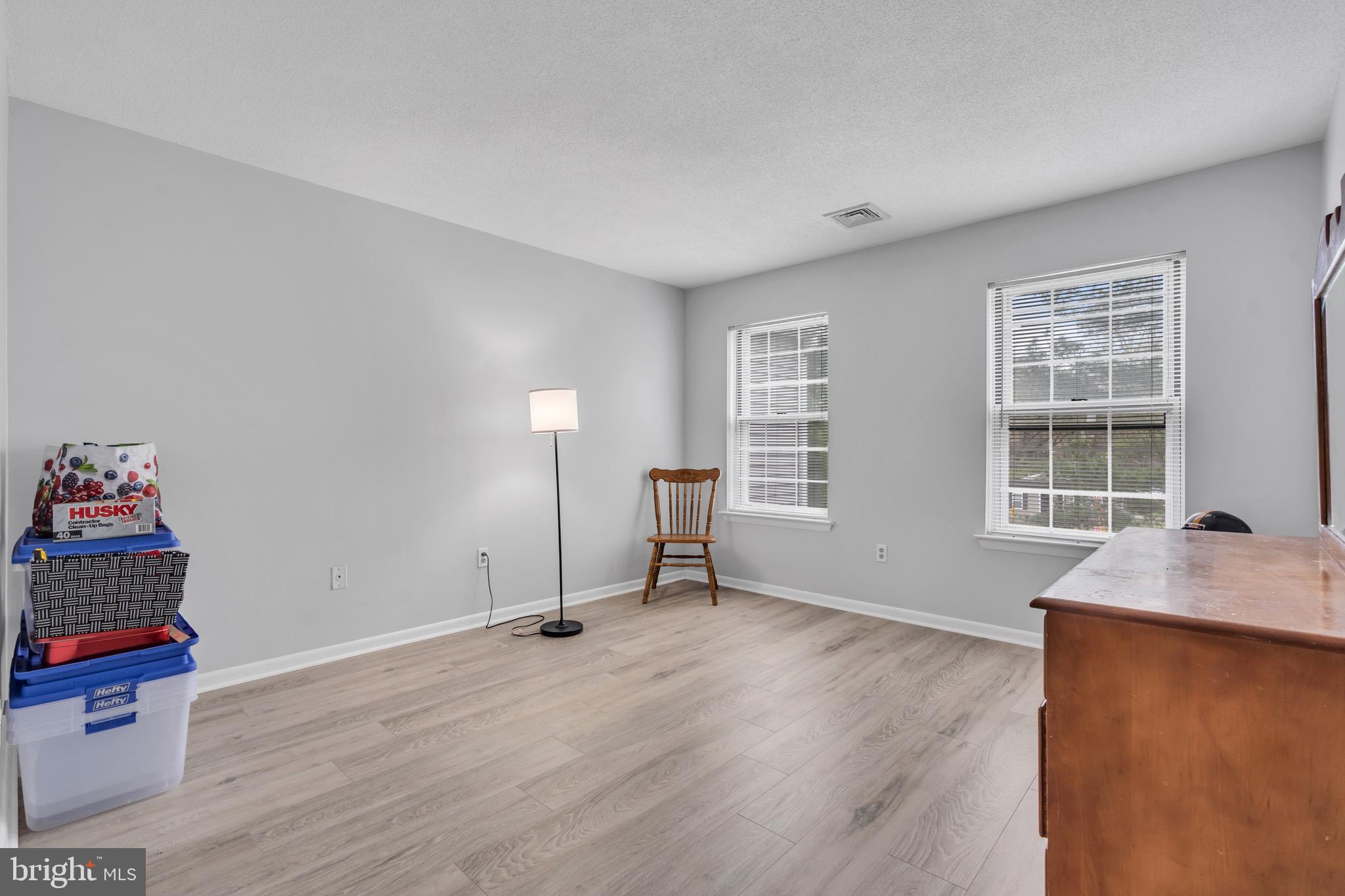 70 Pinewood Drive Hamilton, NJ 08690 - Photo 30 of 40 an empty room with windows