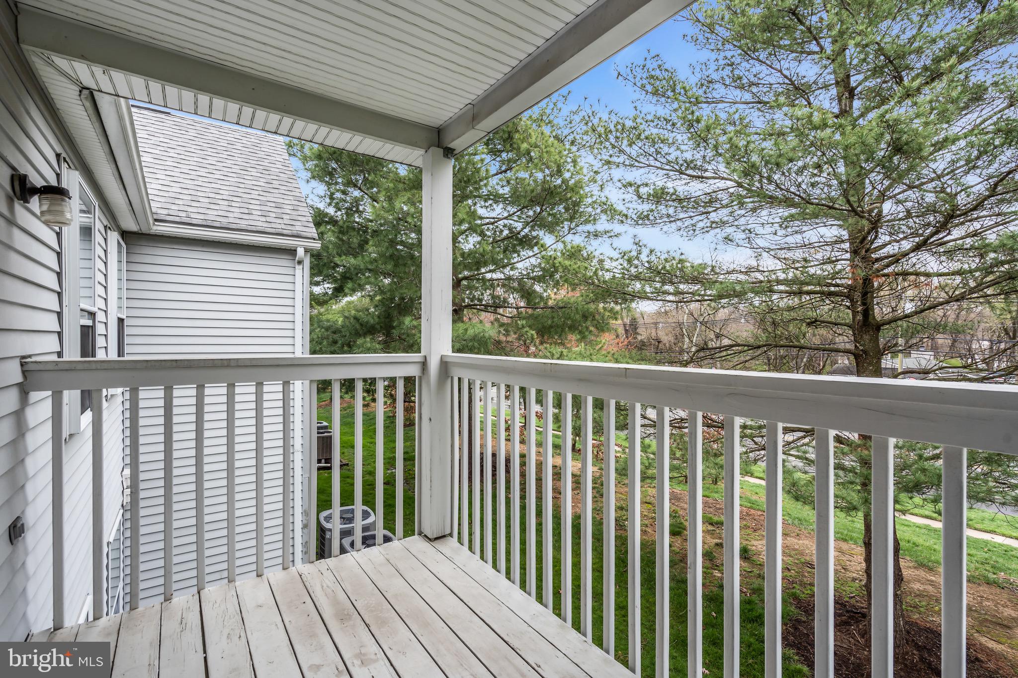 70 Pinewood Drive Hamilton, NJ 08690 - Photo 40 of 40 a view of a wooden balcony