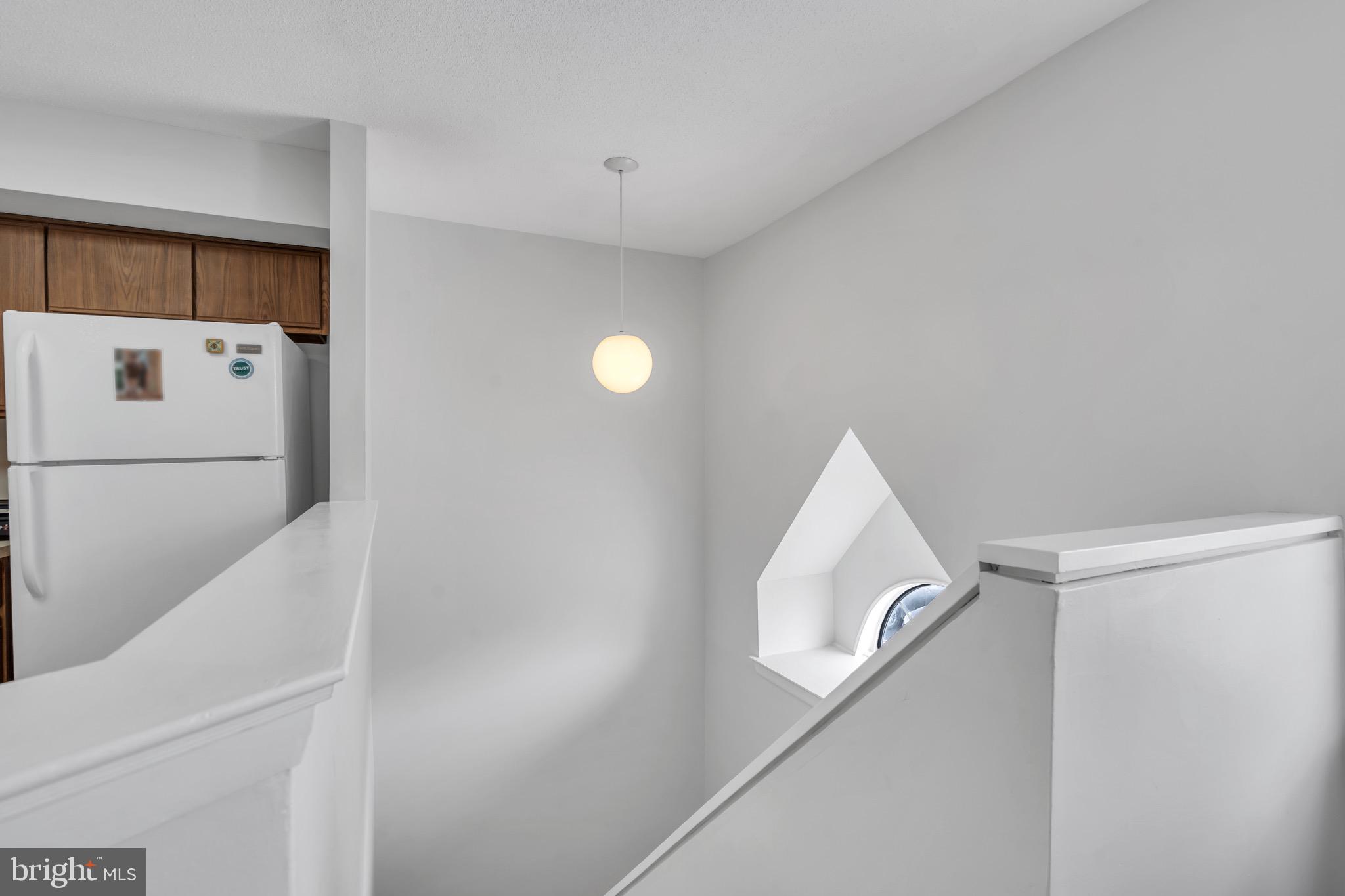 70 Pinewood Drive Hamilton, NJ 08690 - Photo 10 of 40 a view of a hallway with a white walls