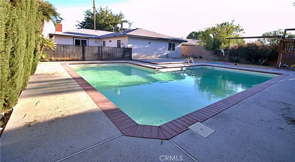 a view of backyard of a house