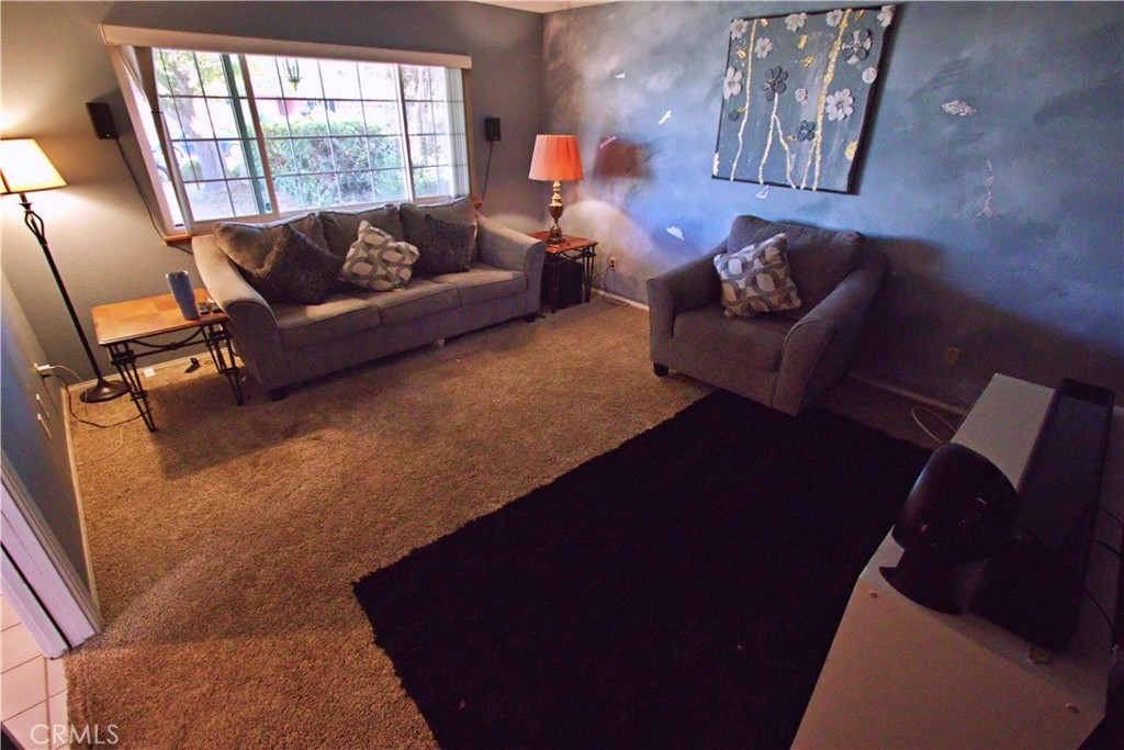 428 West Perdew Avenue Ridgecrest, CA 93555 - Photo 6 of 18 a living room with furniture and a window