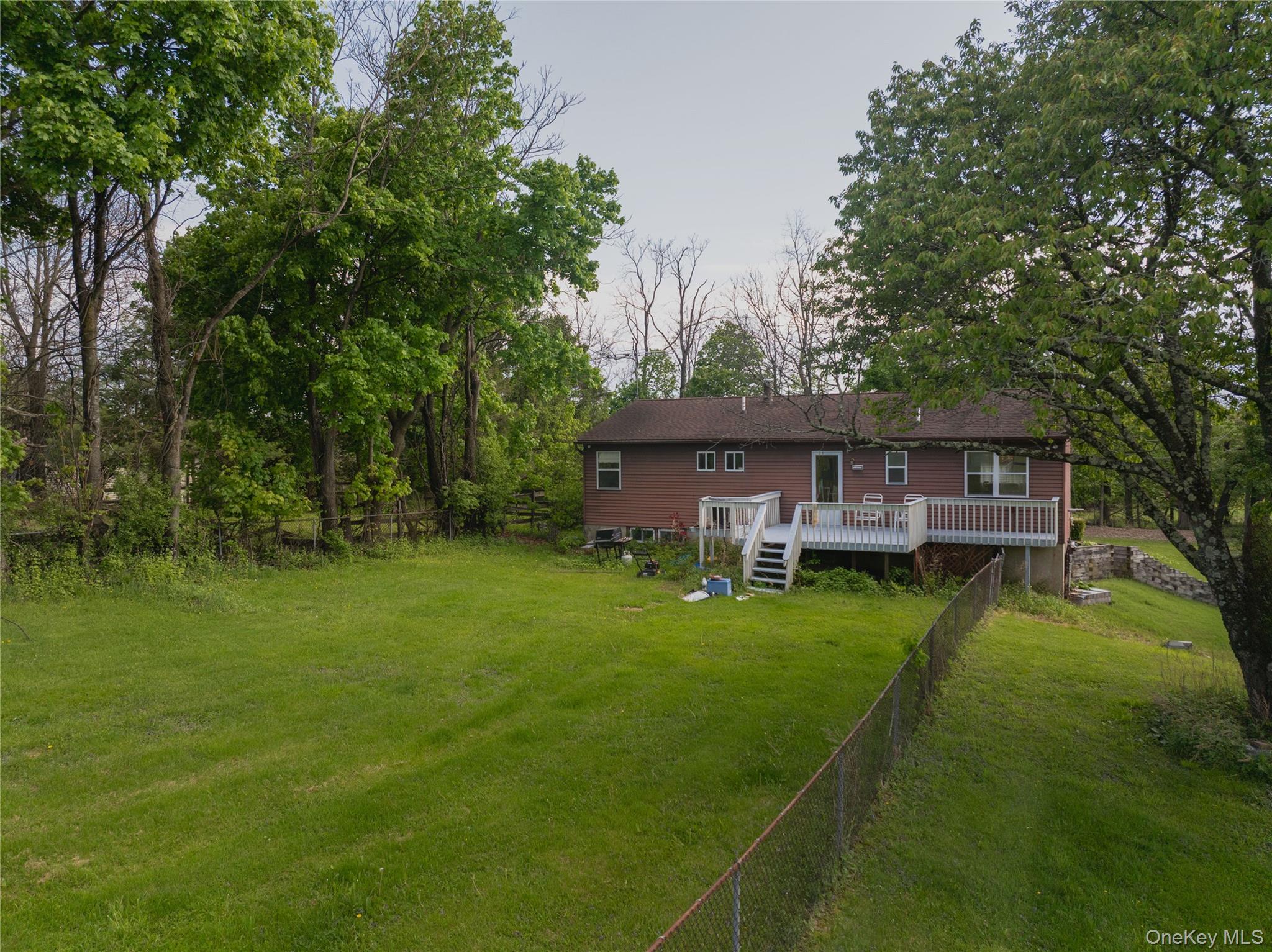 200 Conklingtown Road Goshen, NY 10924 - Photo 13 of 43 a view of a house with a backyard