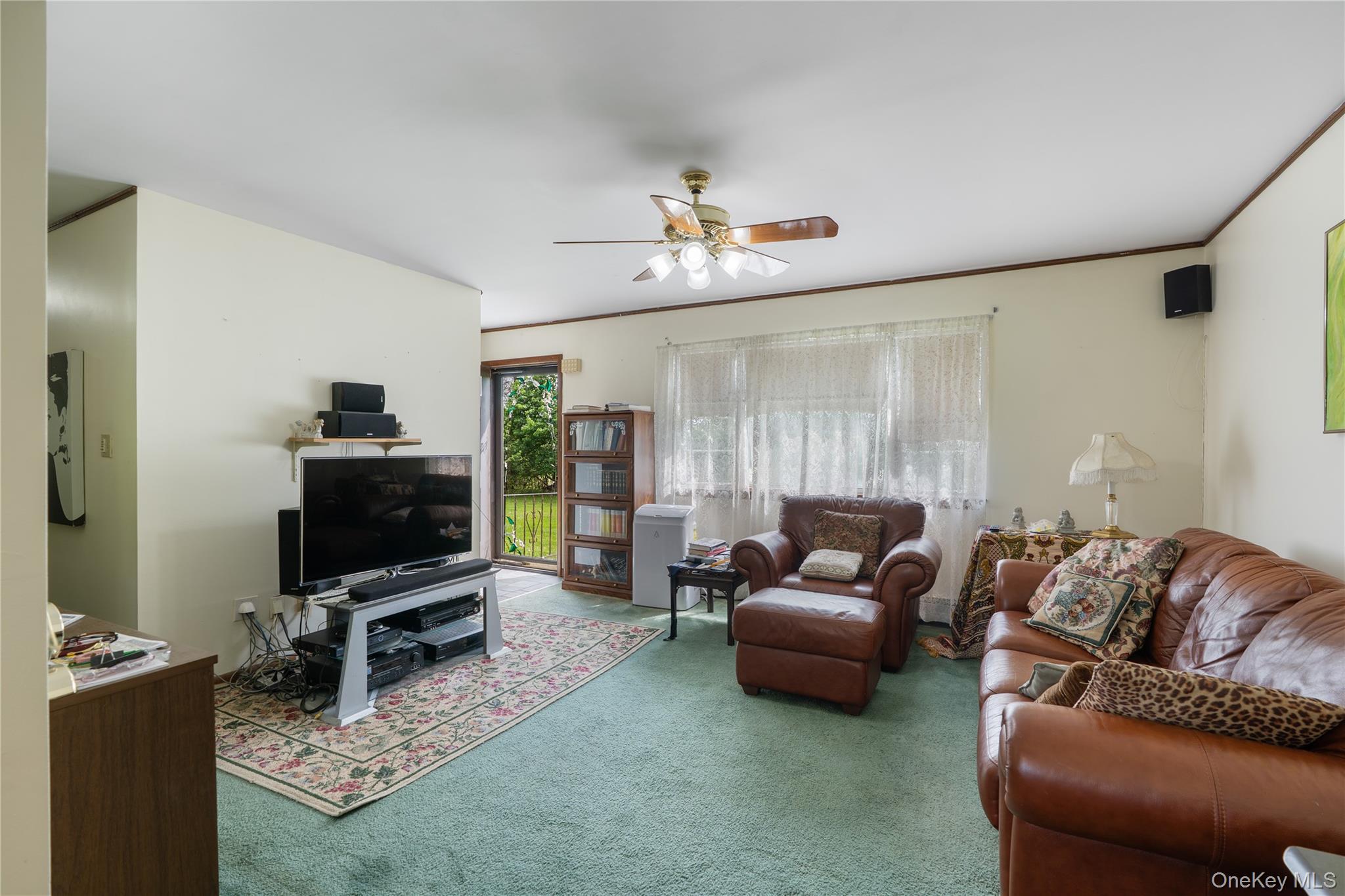 200 Conklingtown Road Goshen, NY 10924 - Photo 24 of 43 a living room with furniture and a flat screen tv