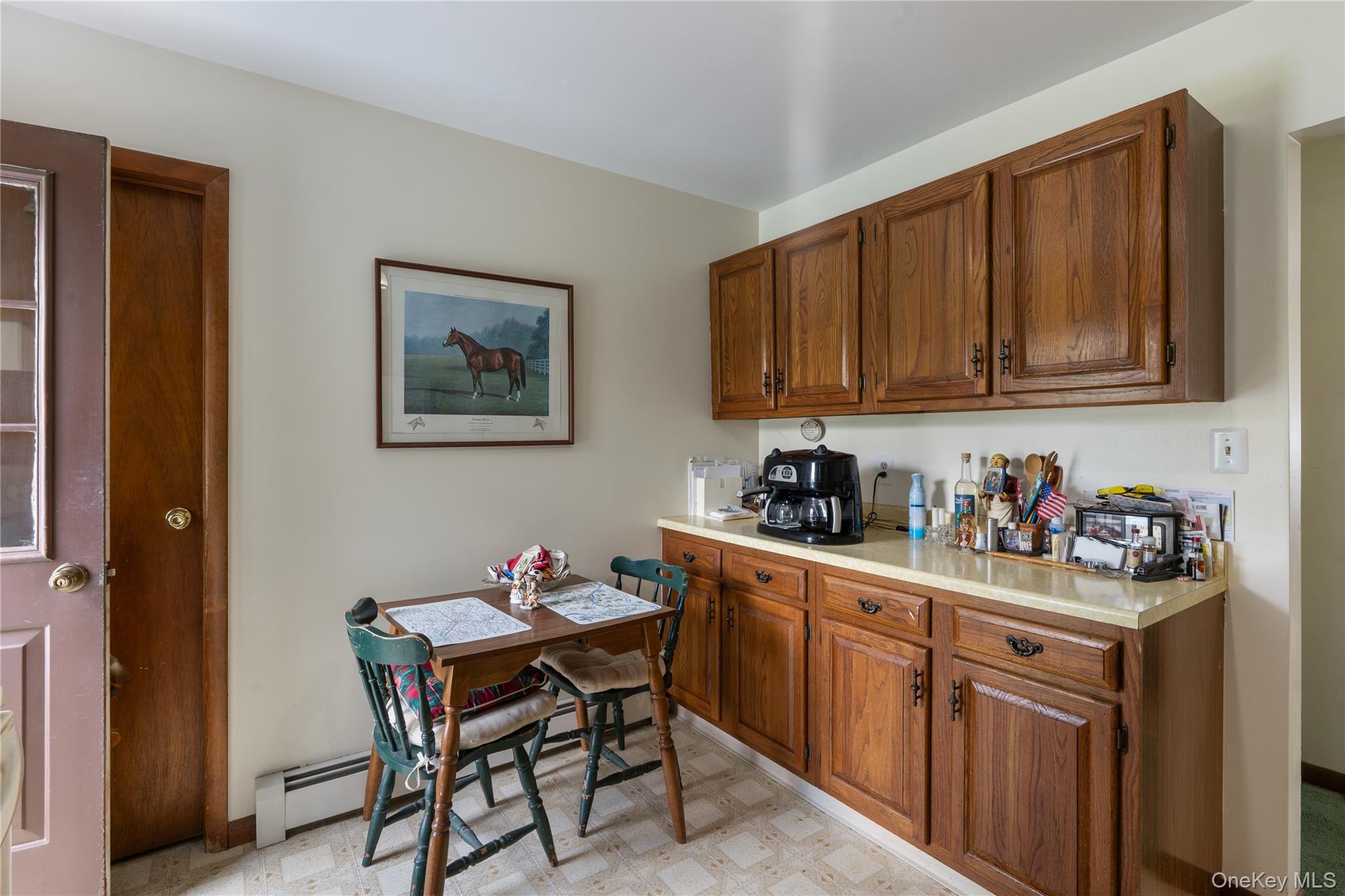 200 Conklingtown Road Goshen, NY 10924 - Photo 30 of 43 a kitchen with a cabinets and chairs in it