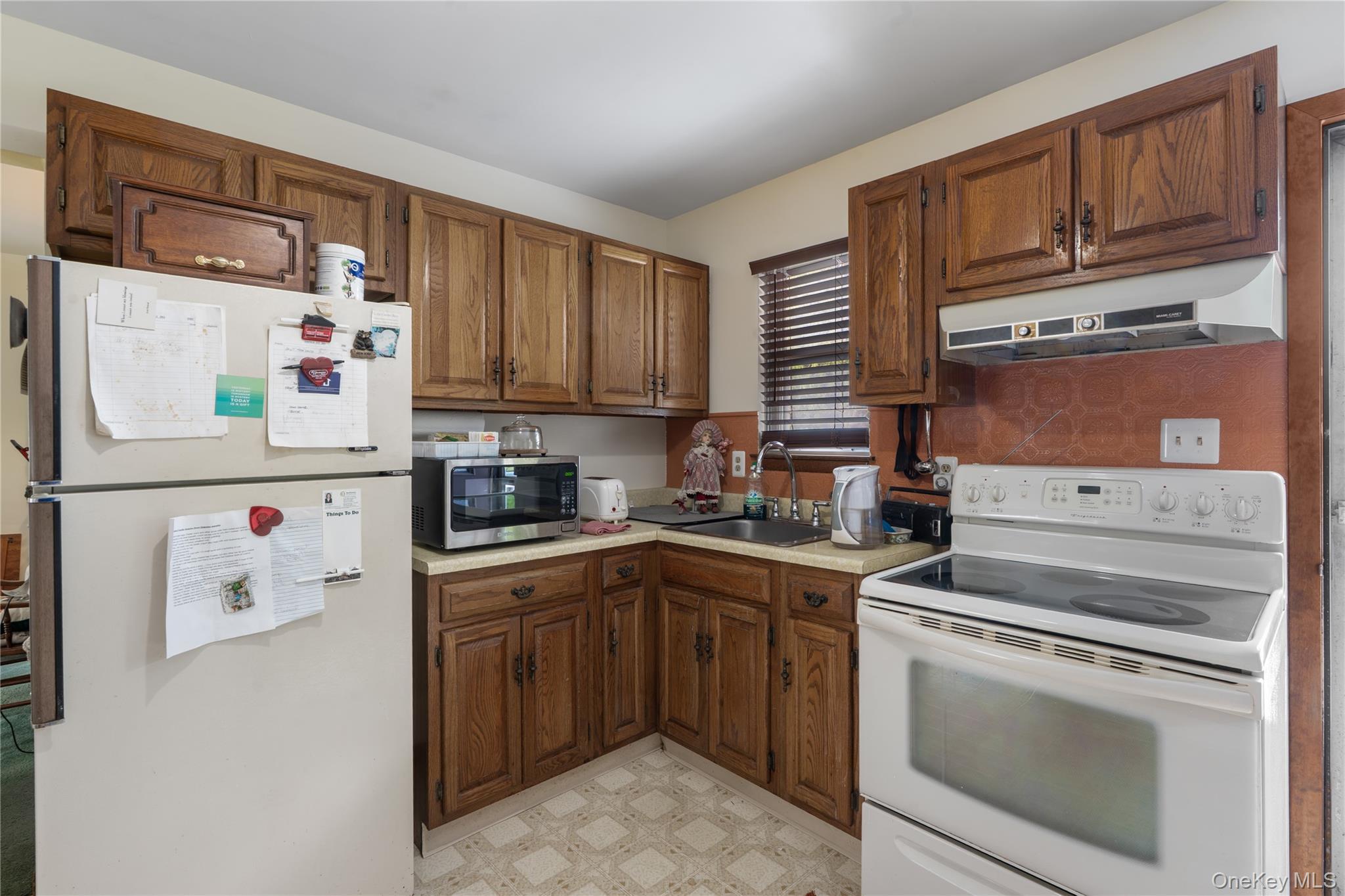200 Conklingtown Road Goshen, NY 10924 - Photo 31 of 43 a kitchen with granite countertop cabinets stainless steel appliances and a sink