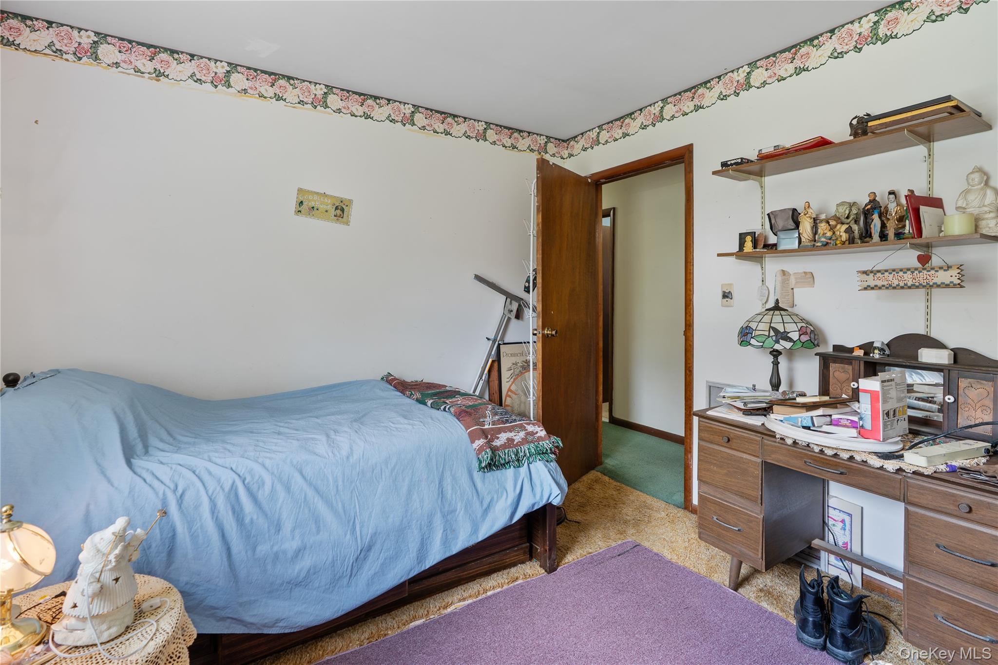 200 Conklingtown Road Goshen, NY 10924 - Photo 36 of 43 a bedroom with a bed and cabinets