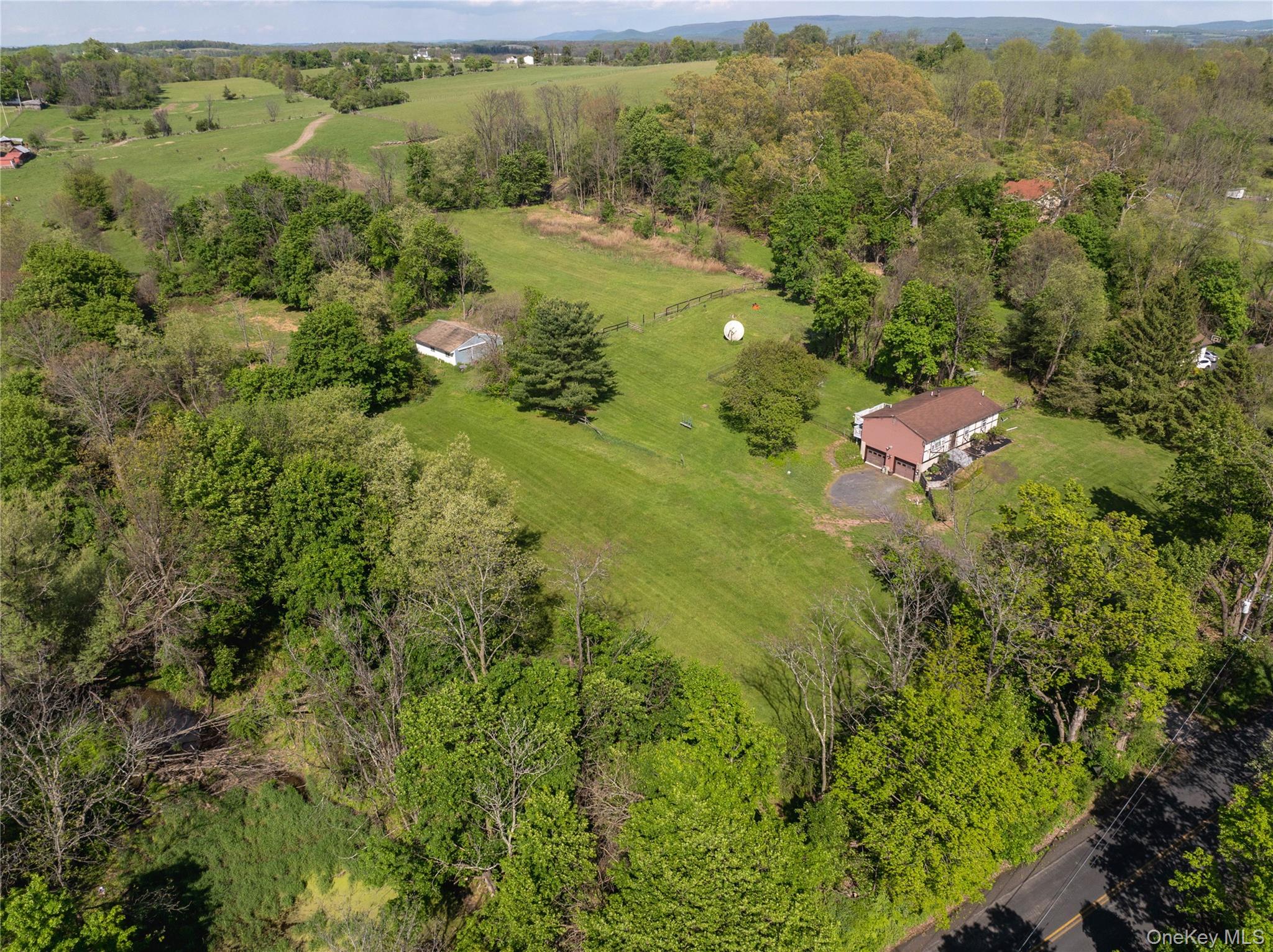 200 Conklingtown Road Goshen, NY 10924 - Photo 5 of 43 a view of a forest with a houses