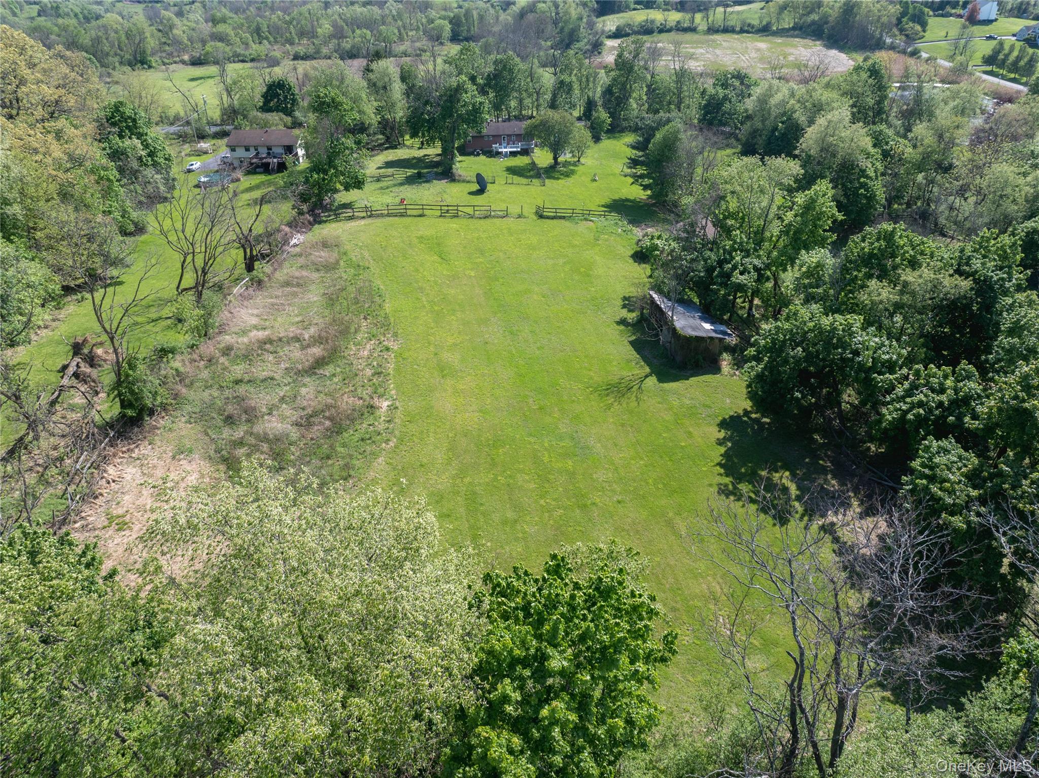 200 Conklingtown Road Goshen, NY 10924 - Photo 6 of 43 an aerial view of residential houses with outdoor space and trees