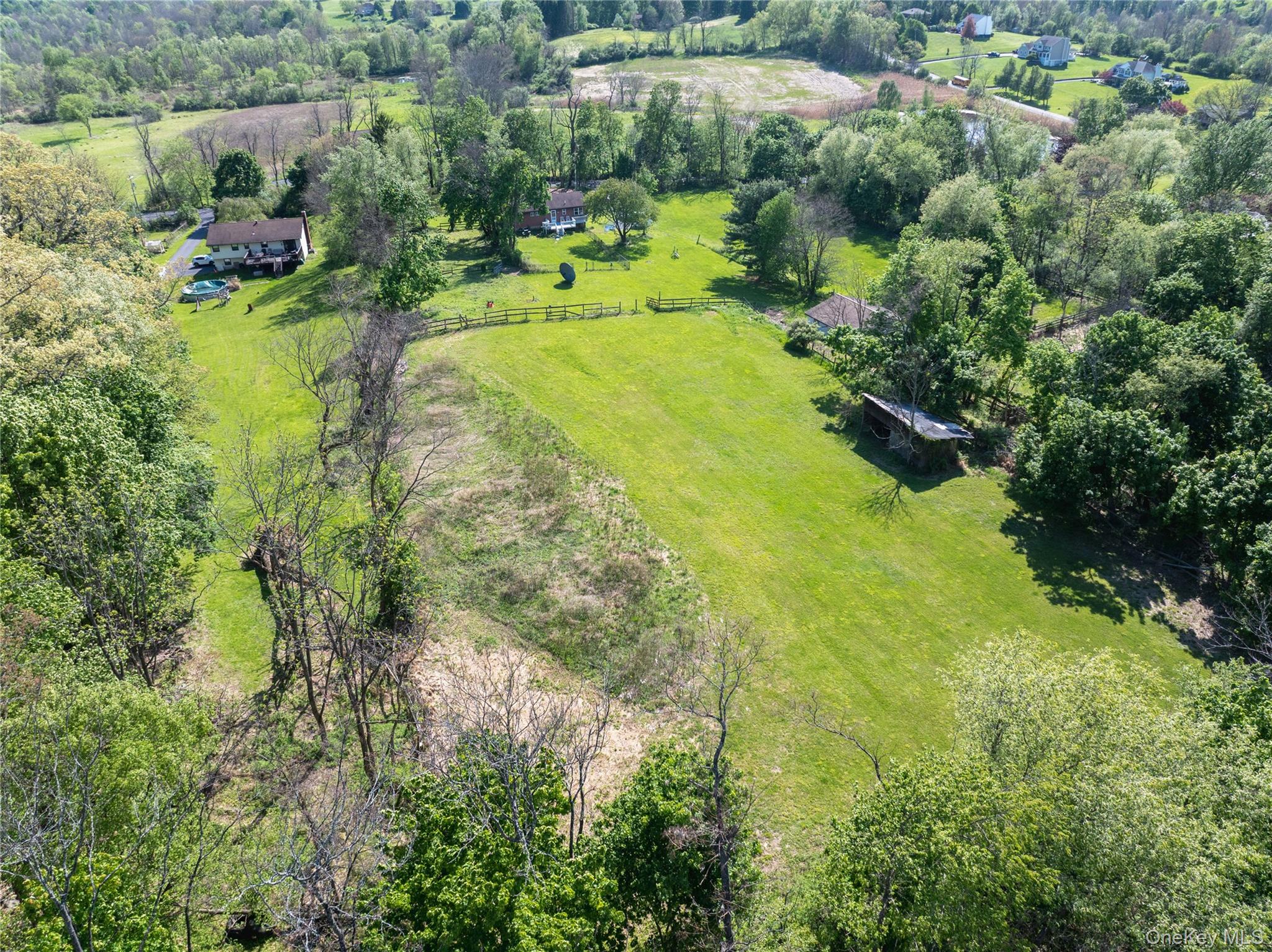 200 Conklingtown Road Goshen, NY 10924 - Photo 7 of 43 a view of a garden with a lake
