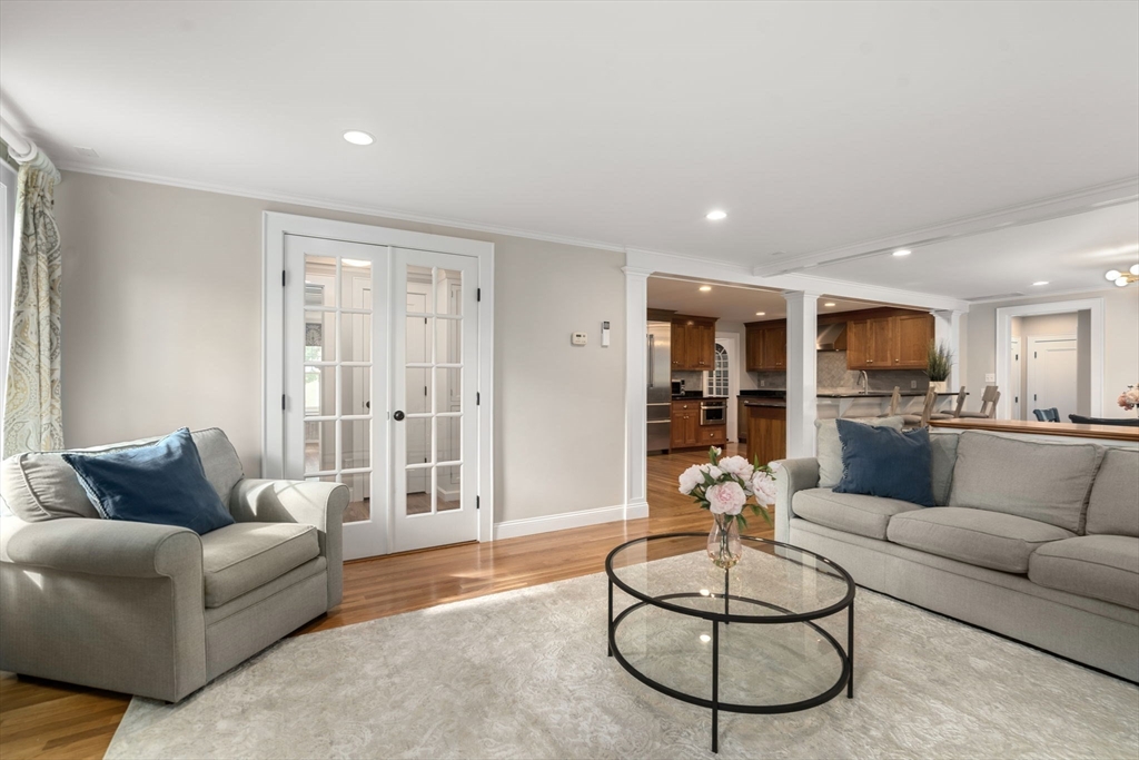 43 Bertwell Road Lexington, MA 02420 - Photo 13 of 37 a living room with furniture white walls and a large window