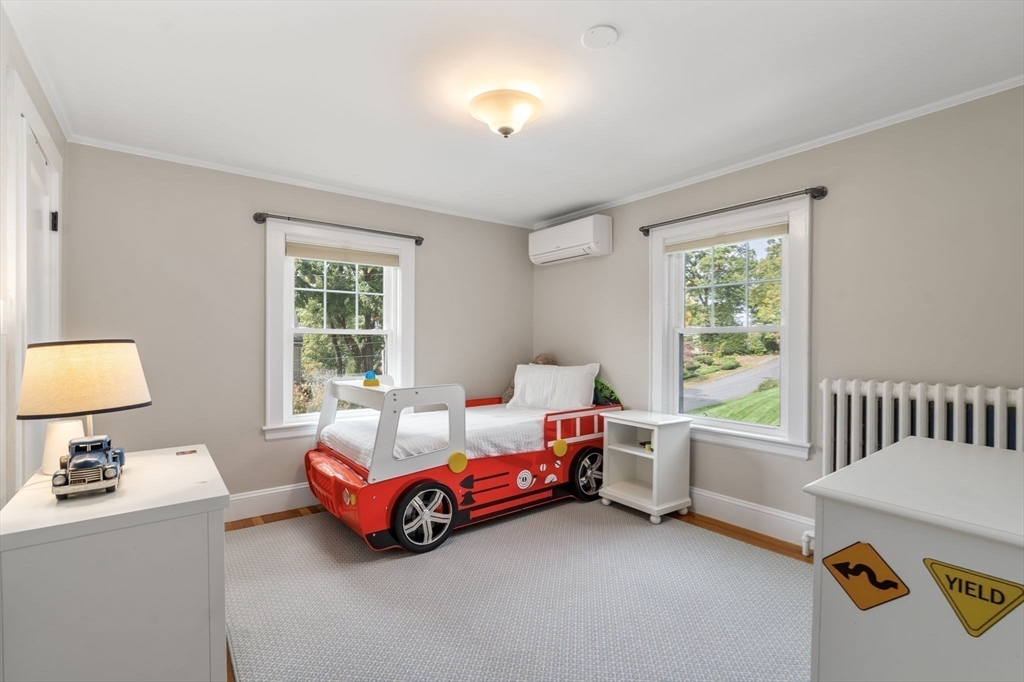 43 Bertwell Road Lexington, MA 02420 - Photo 19 of 37 a bedroom with bed and a window