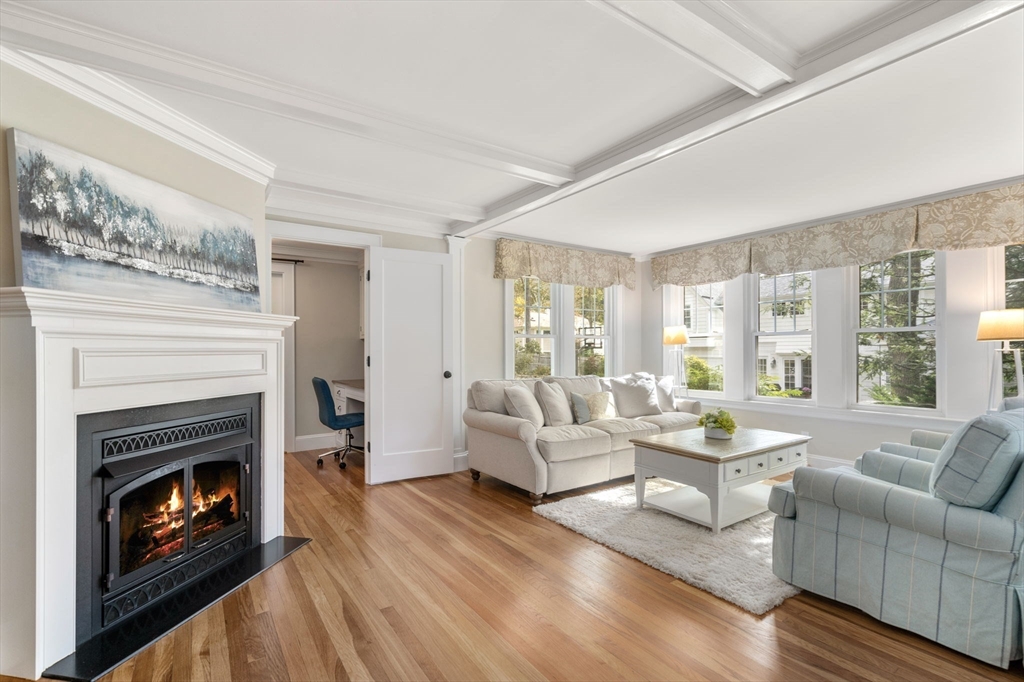43 Bertwell Road Lexington, MA 02420 - Photo 2 of 37 a living room with furniture and a fireplace