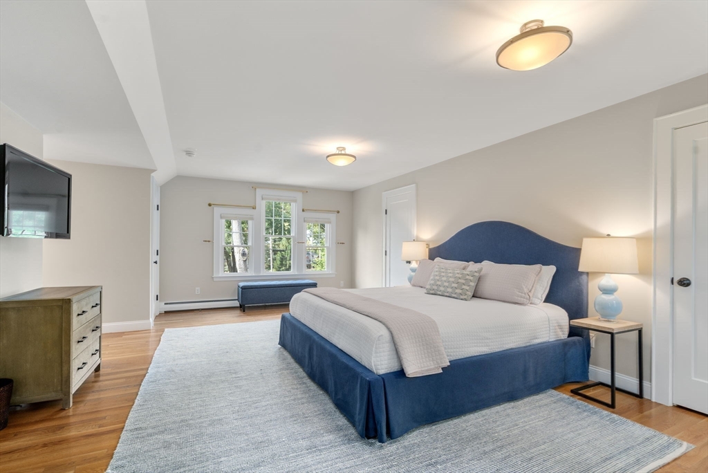 43 Bertwell Road Lexington, MA 02420 - Photo 22 of 37 a bedroom with a bed and window