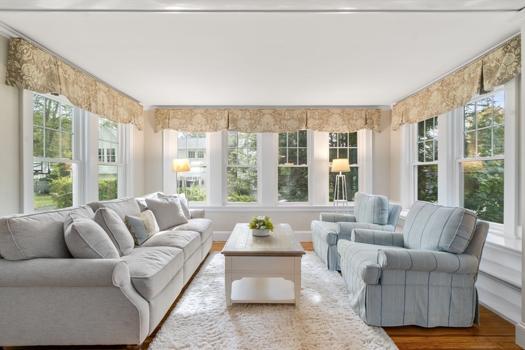 43 Bertwell Road Lexington, MA 02420 - Photo 3 of 37 a living room with furniture and floor to ceiling windows