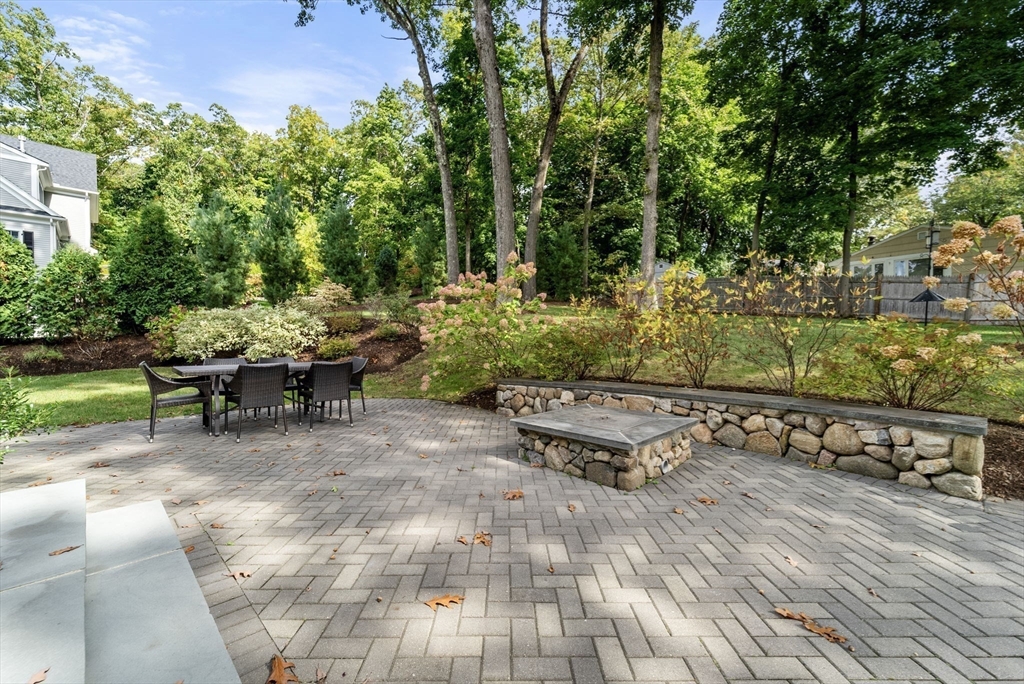 43 Bertwell Road Lexington, MA 02420 - Photo 34 of 37 a view of a backyard with sitting area