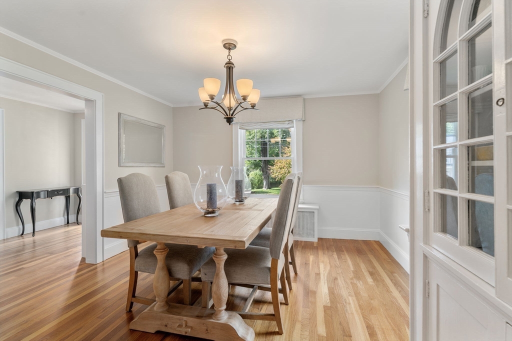 43 Bertwell Road Lexington, MA 02420 - Photo 4 of 37 a view of a dining room with furniture wooden floor and chandelier