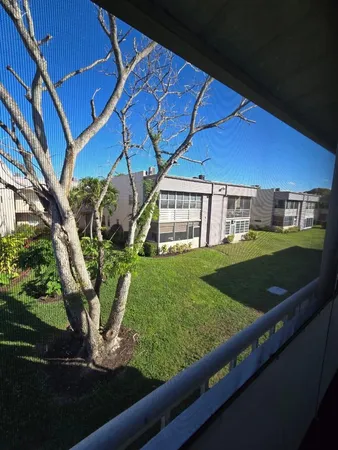 a view of a porch with a yard