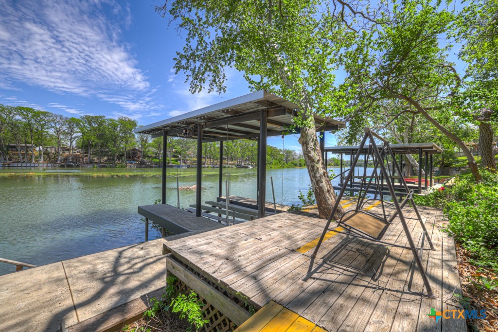 1015 Reiley Road Seguin, TX 78155 - Photo 28 of 45 a view of a patio with two couches next to a yard