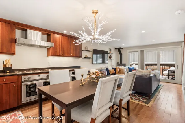 a view of kitchen with cabinets and wooden floor