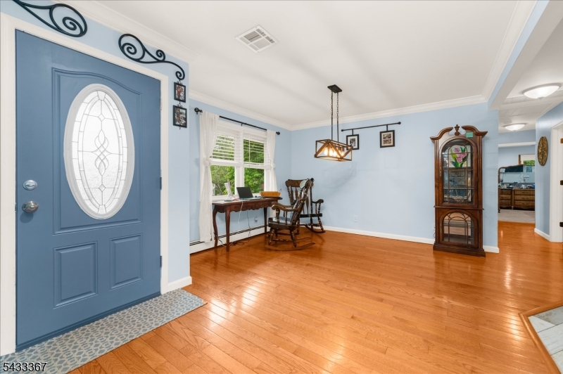 650 Woodglen Road Glen Gardner, NJ 08826 - Photo 6 of 28 a view of a livingroom with furniture and a window