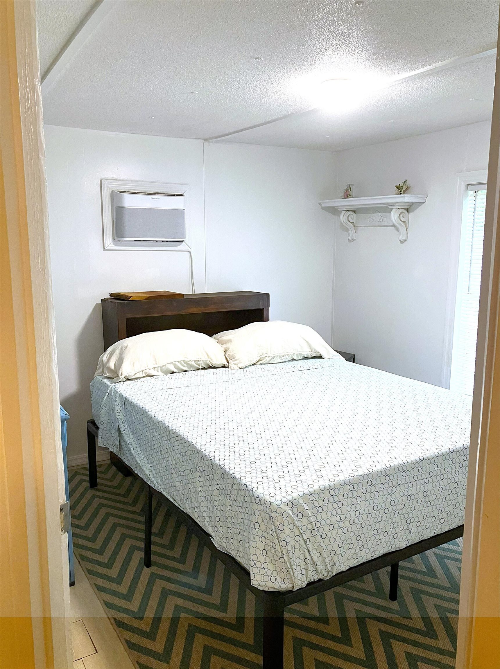 1611 Brian Way St. Augustine, FL 32084 - Photo 8 of 23 a bedroom with a bed and a table