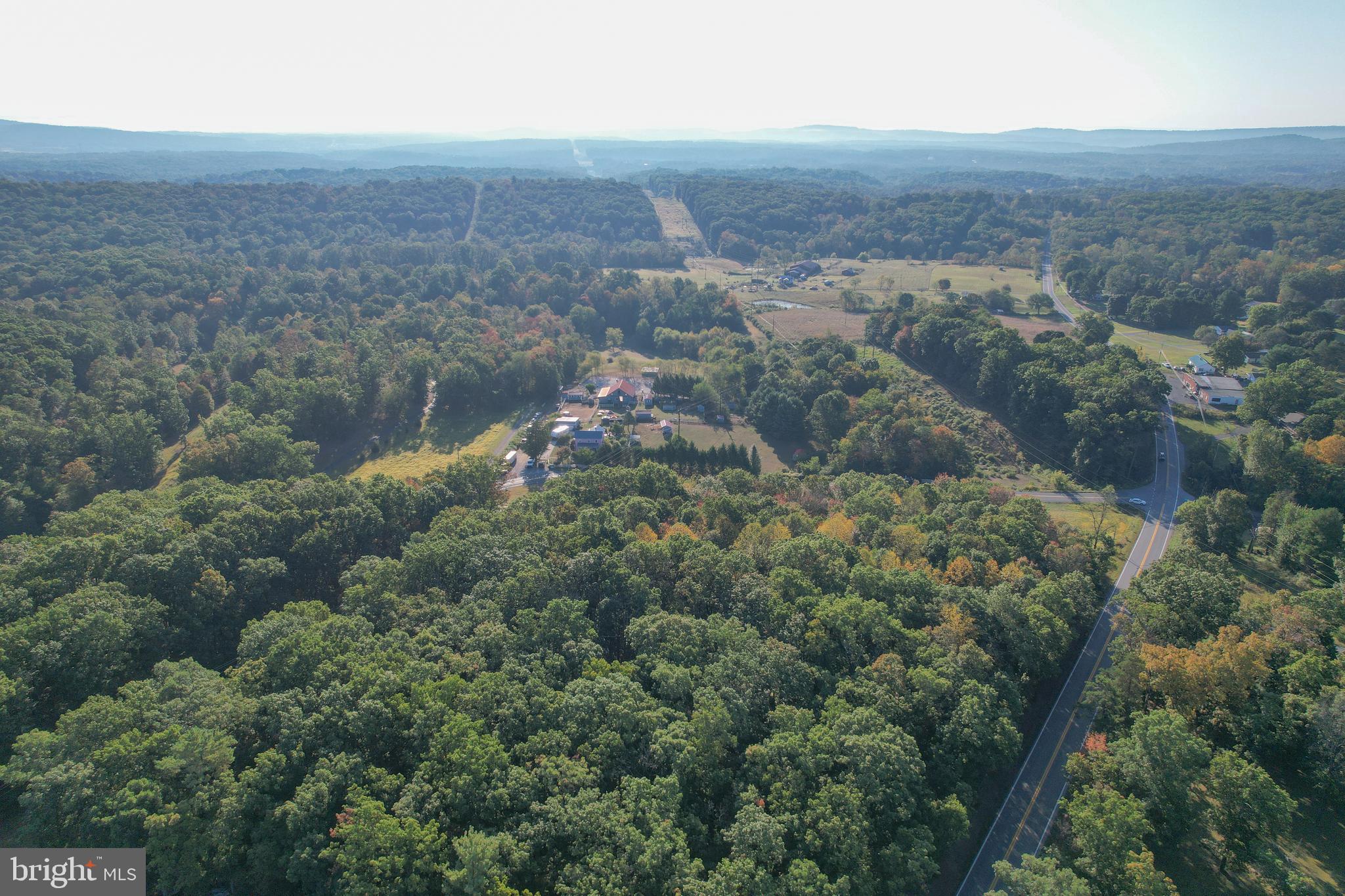 9 Martinsburg Road Berkeley Springs, WV 25411 - Photo 6 of 6 an aerial view of residential house and green space