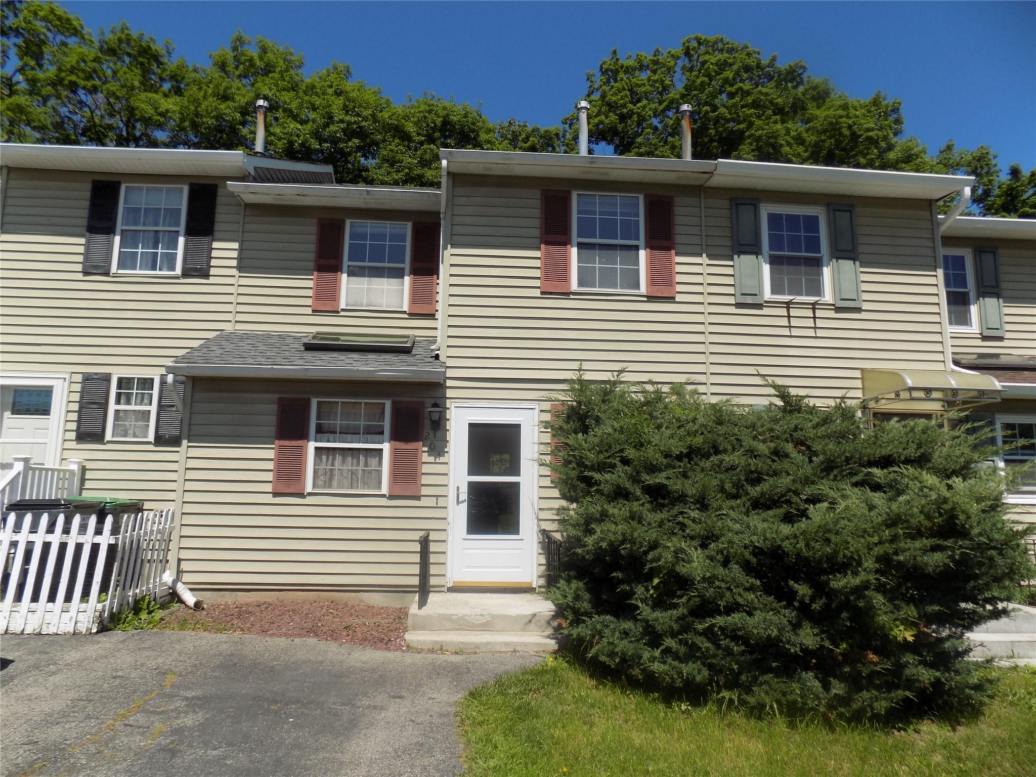 204 Blake Road Maybrook, NY 12543 - Photo 1 of 1 a house that has a lot of windows on it