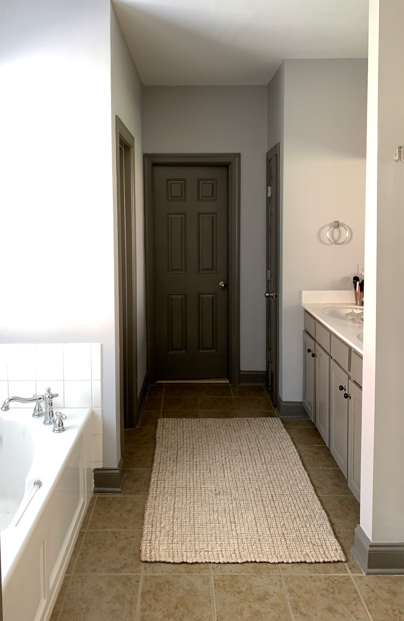 329 Wandering Circle Franklin, TN 37067 - Photo 14 of 23 a bathroom with a sink a mirror and a bathtub