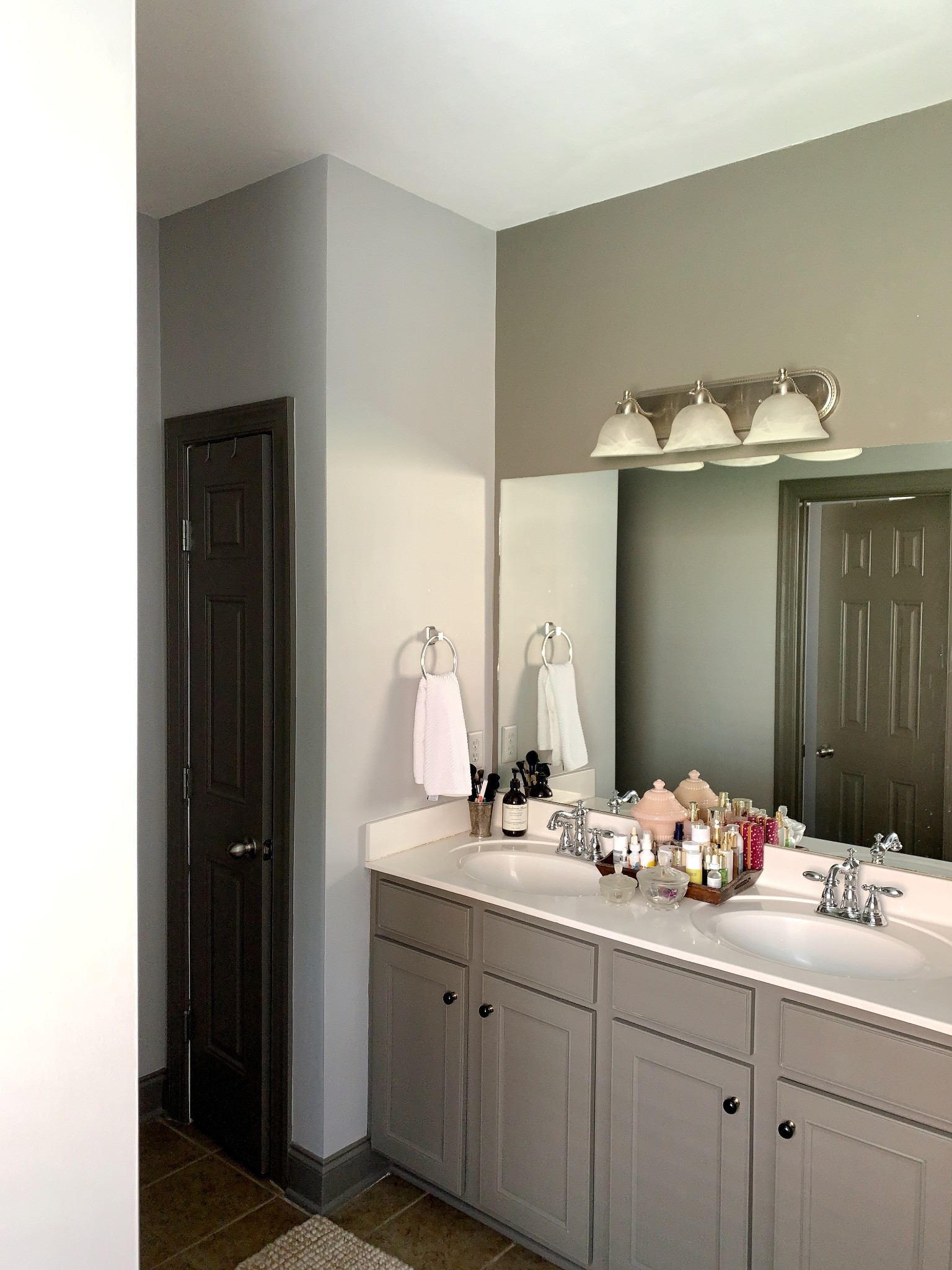 329 Wandering Circle Franklin, TN 37067 - Photo 15 of 23 a bathroom with a double vanity sink and mirror