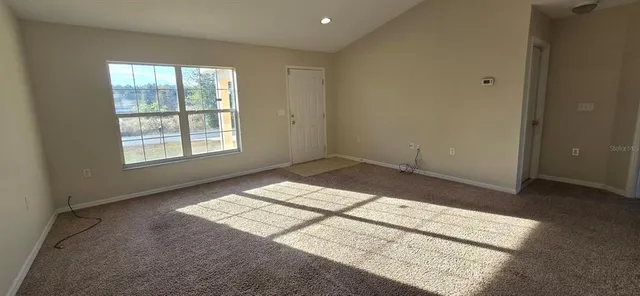 an empty room with windows