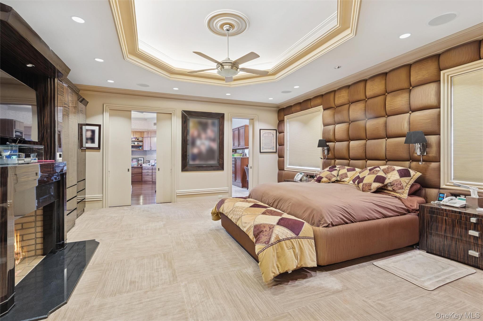 22 Willow Road Woodmere, NY 11598 - Photo 9 of 27 a spacious bedroom with a bed and a walk in closet