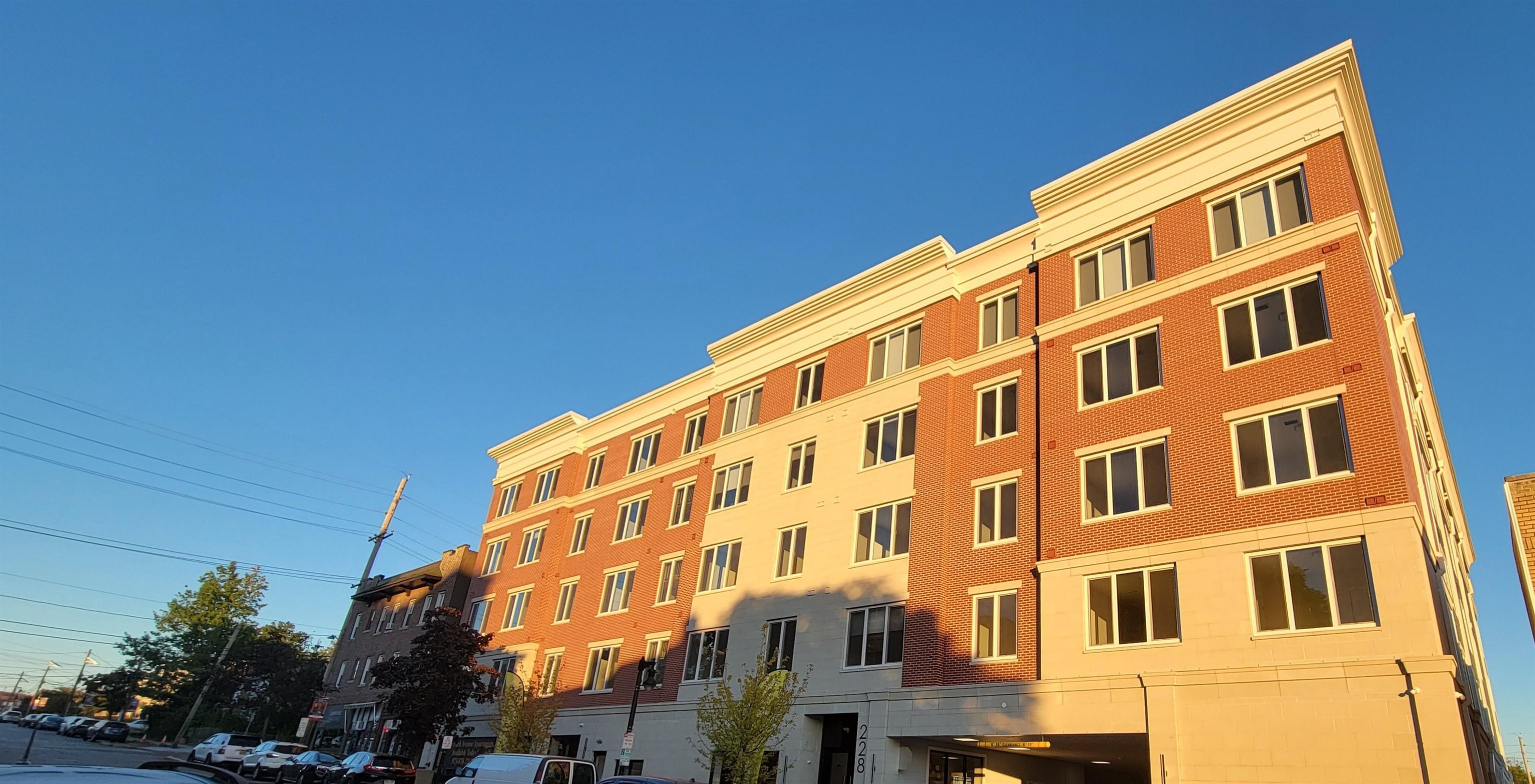 228 Park Avenue, Unit 305 East Rutherford, NJ 07073 - Photo 2 of 11 a front view of a building